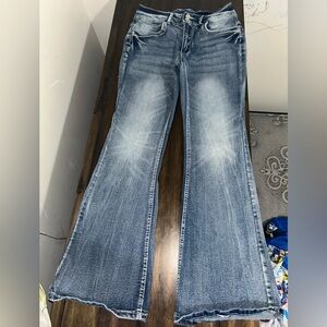 Medium mid rise boot jean